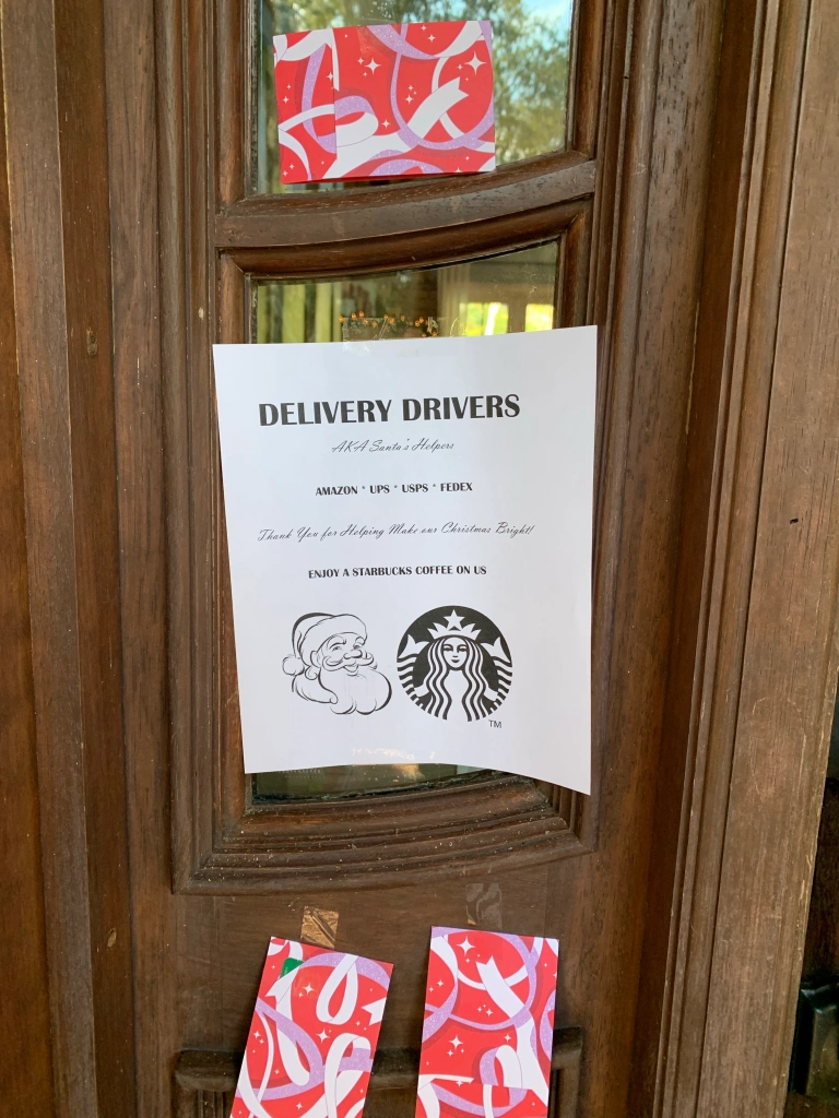 note on front door for deliver drivers with Starbucks cards